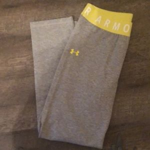 Under Armour grey and yellow Capri leggings.